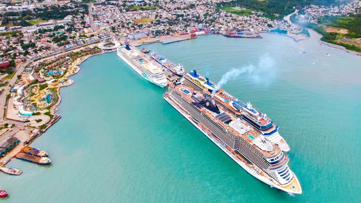 Aerial view of Taino Bay cruise terminal next to downtown Puerto Plata with two ships alongside
